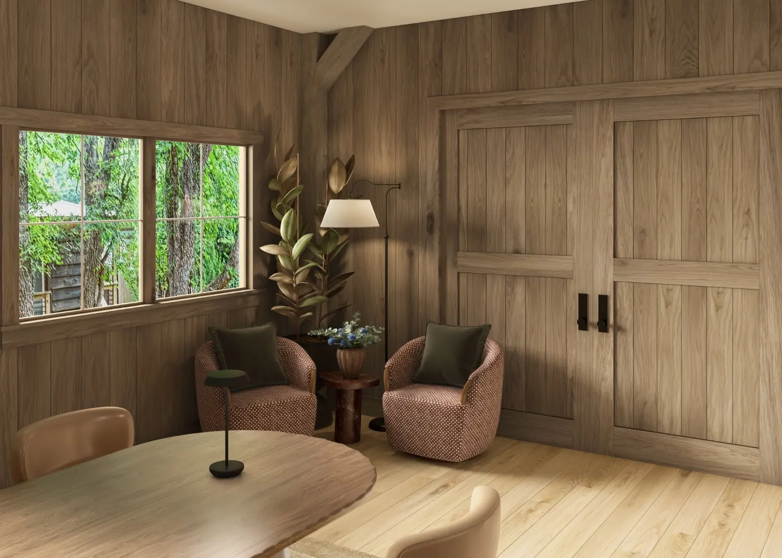 Design center lounge with oak-panelled walls and rounded armchairs